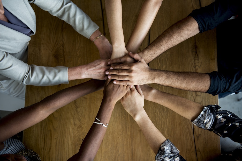 Human hands together holding together