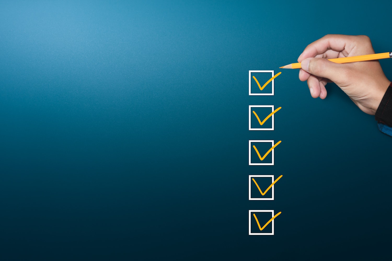 Orange marking on checklist box with pen, Checklist concept