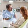 An orthodontists consults with a patient. Explore every orthodontic practice transition option, from traditional sales to a DSO to partnership models, before deciding what's right for your practice.