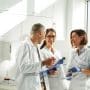 A team of orthodontist work together. How long does it take to transition an orthodontic practice? Learn more about practice transition guidelines in our complete guide.